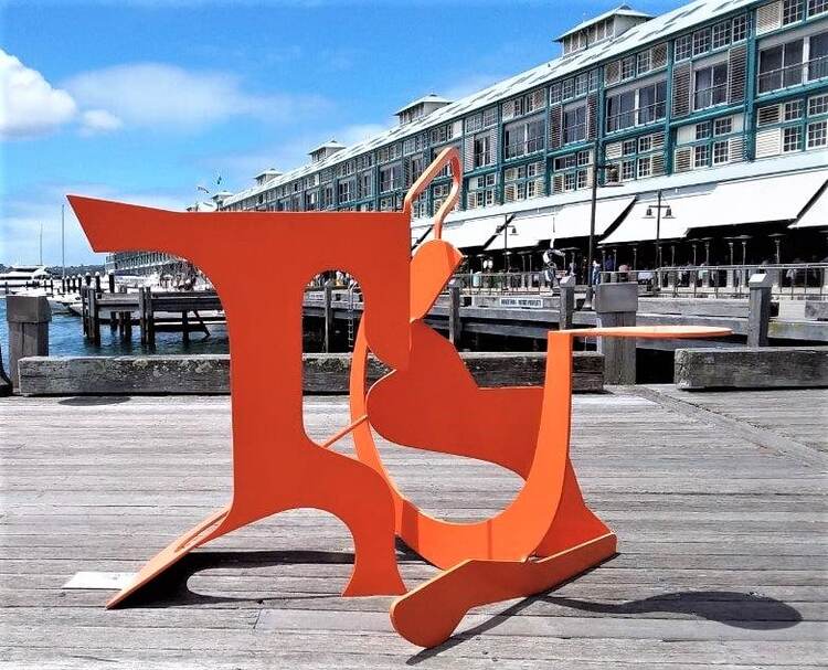 orange outdoor colourful steel sculpture