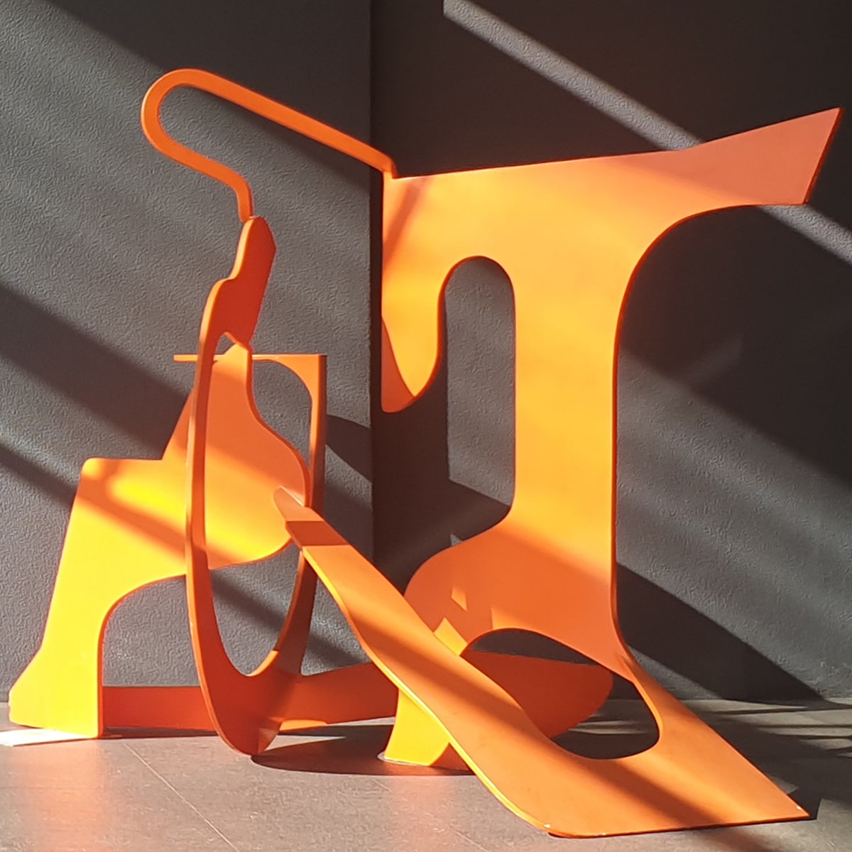 orange outdoor colourful steel sculpture