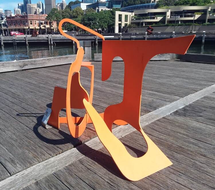 orange outdoor colourful steel sculpture