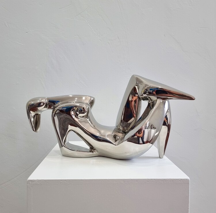 stainless steel indoor sculpture female figurative