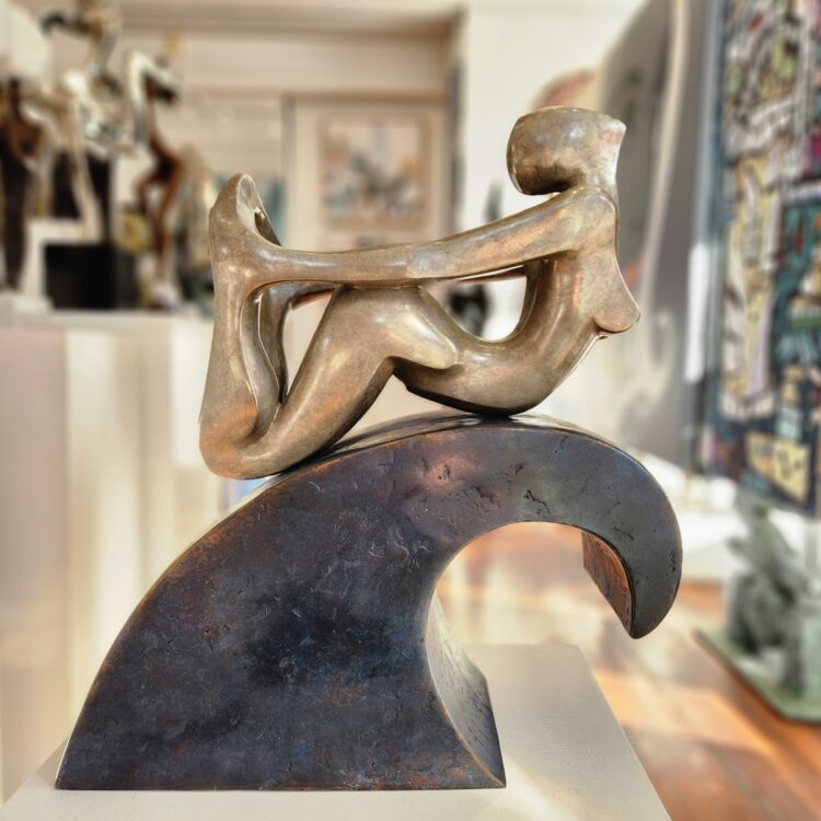 surfer sculpture bronze wave