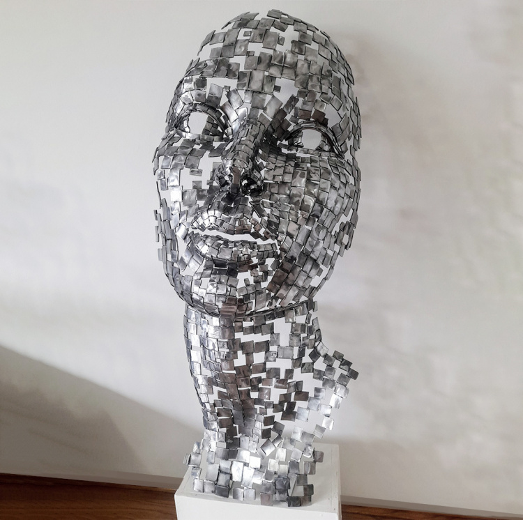 metal head sculpture